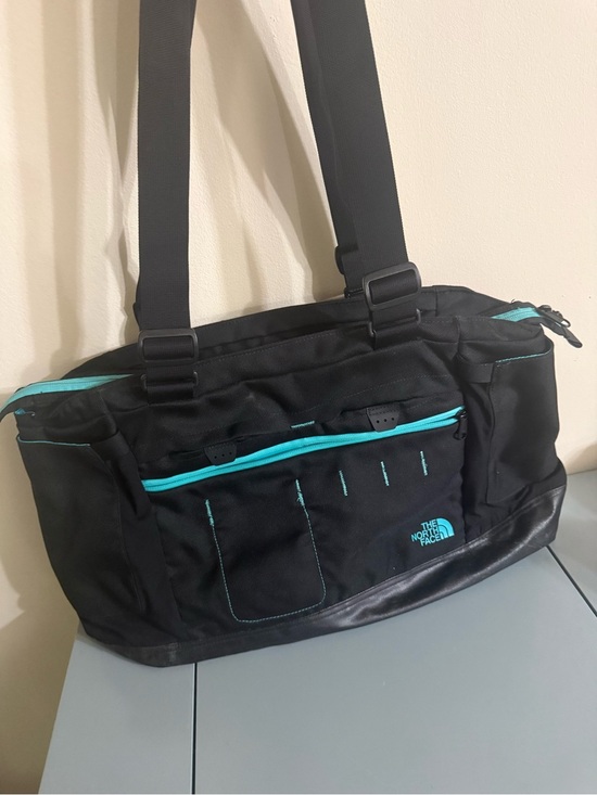 The North Face Handbags - THE North Face Tote Backpack Duffle Black Blue Bag 17.5” W 10” L